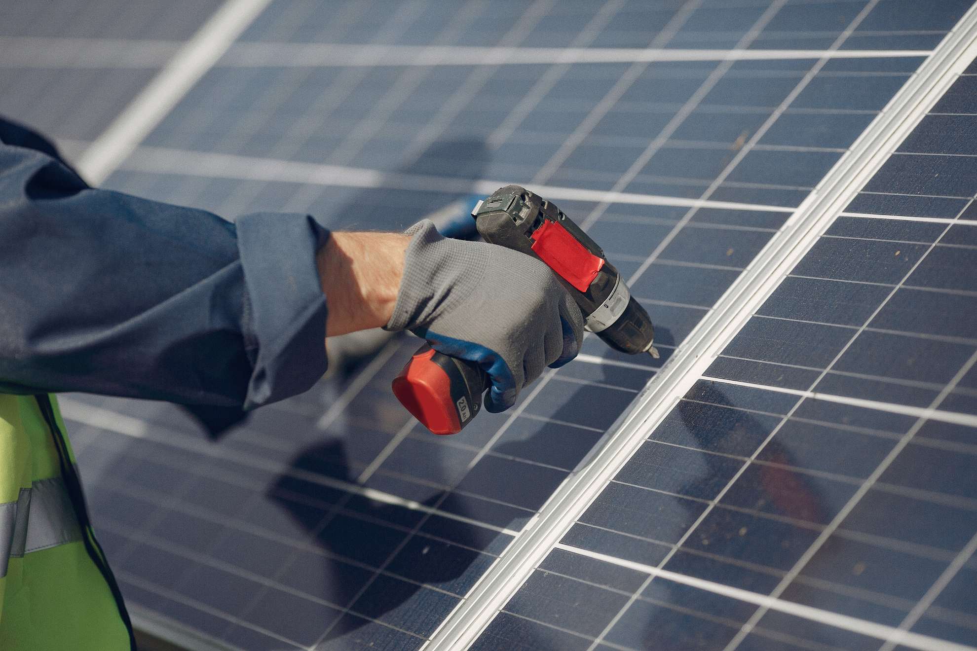 Powertrack Engineer repairing solar panel